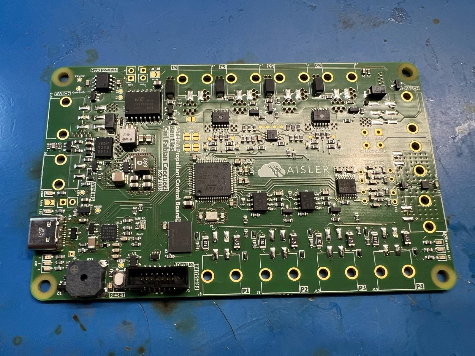 The assembled Propellant Control Board: STM32G4 at centre, four solenoid channels along the top edge, pressure ports along the bottom and the isolated CAN section at the top left
