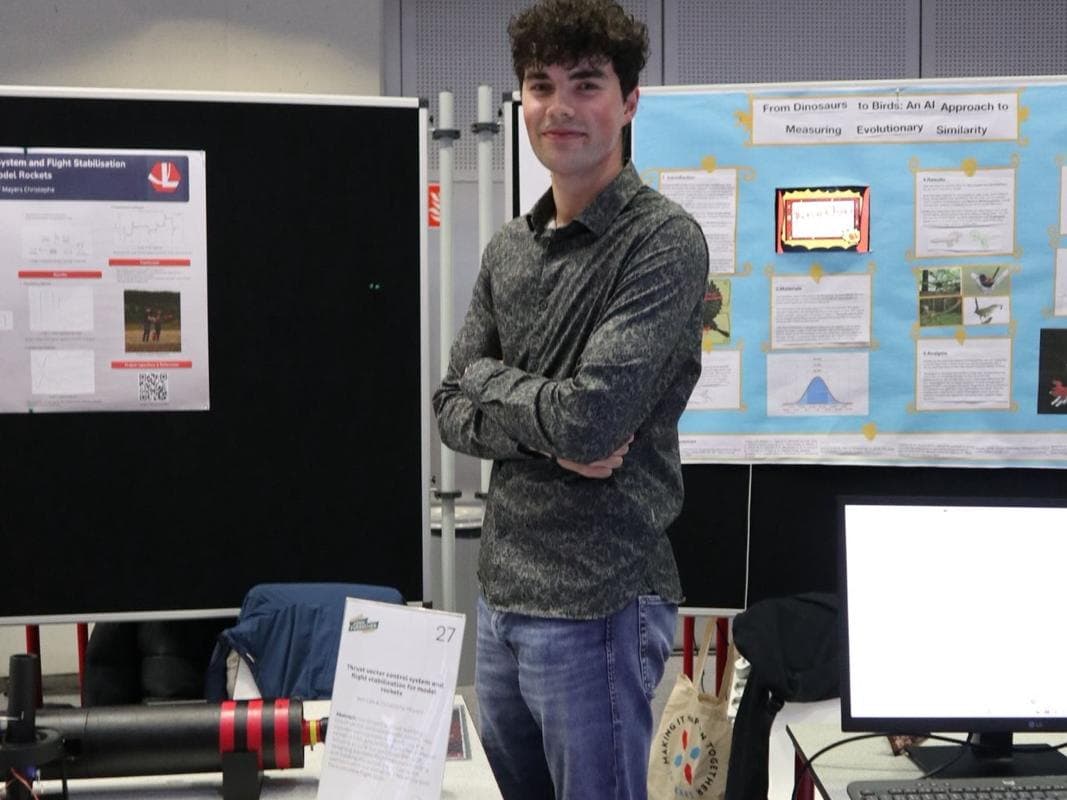 Ben Lies presenting the rocket project at an exhibition stand